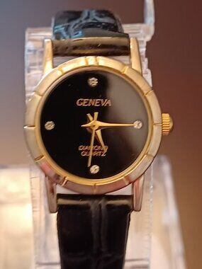 Vintage Ladies GENEVA Diamond Quartz Gold Tone Watch with Black Band - WORKS!